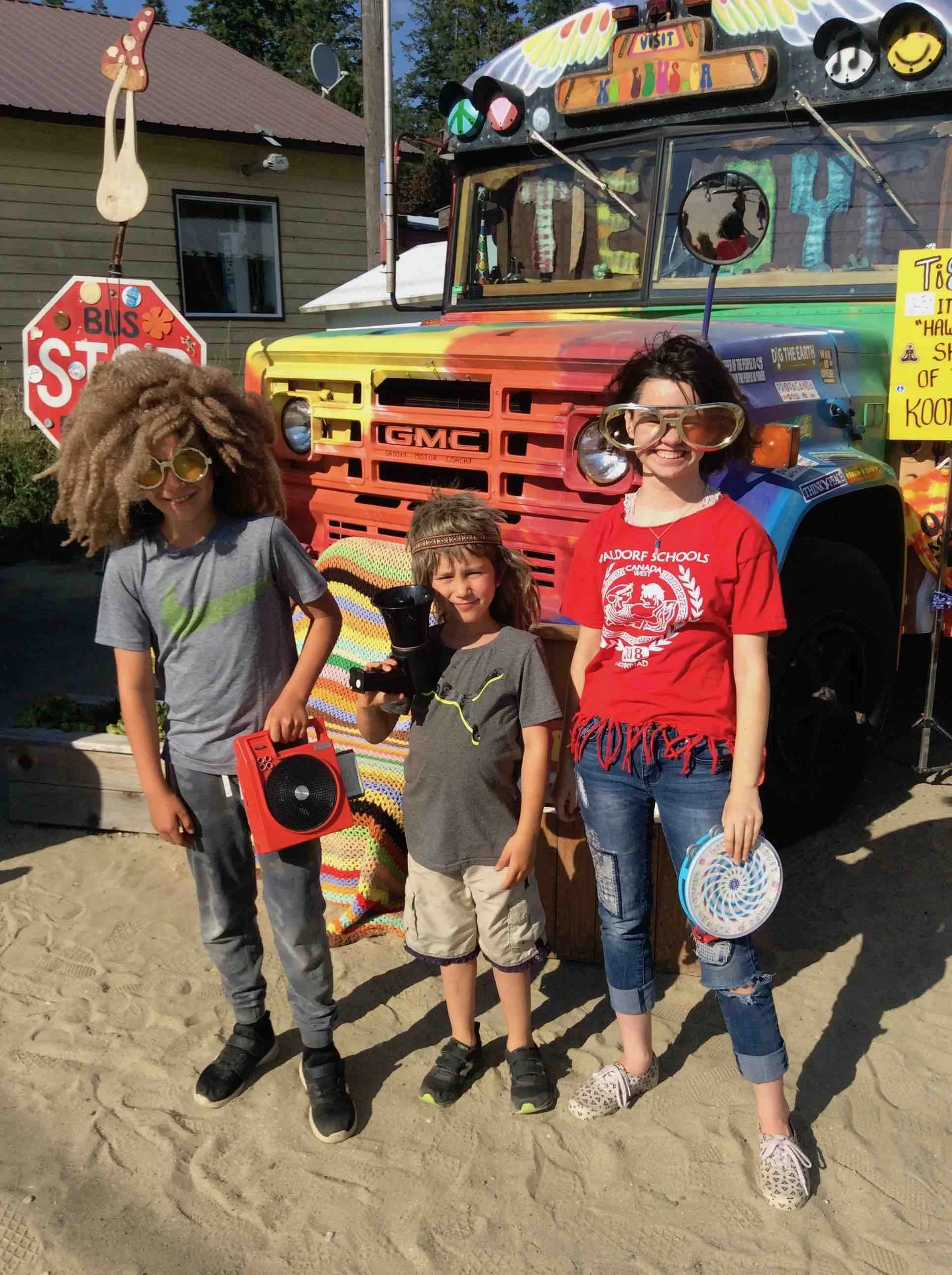 Ruth with our friends Amri and Piers at the Kool Bus, Balfour Ferry Terminal.