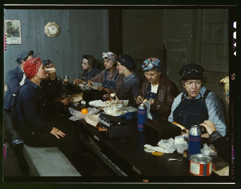 Women workers employed as wipers in the roundhouse having lunch in their rest room. Source