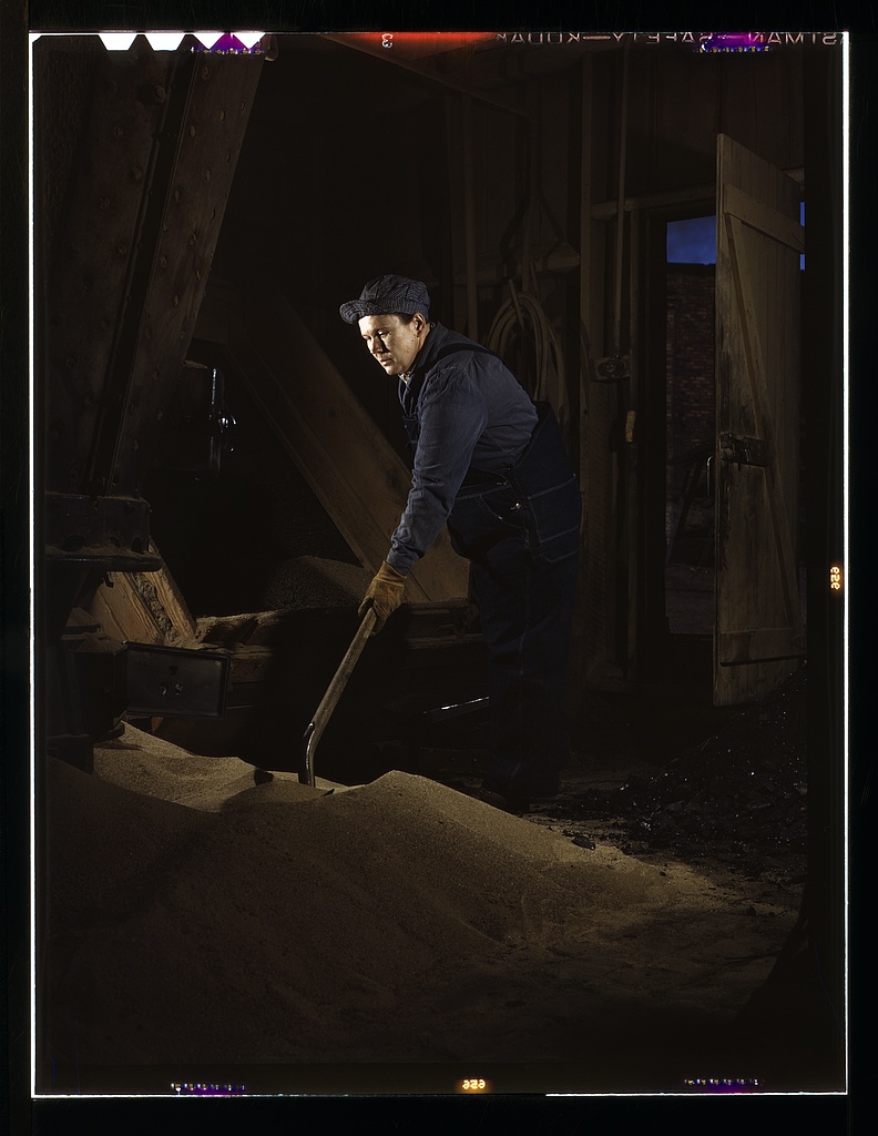 Chicago and North Western R.R., Thelma Cuvage, working in the sand house at the roundhouse, Clinton, Iowa. Her job is to see that sand is sifted and cleaned for use in the locomotives. Source