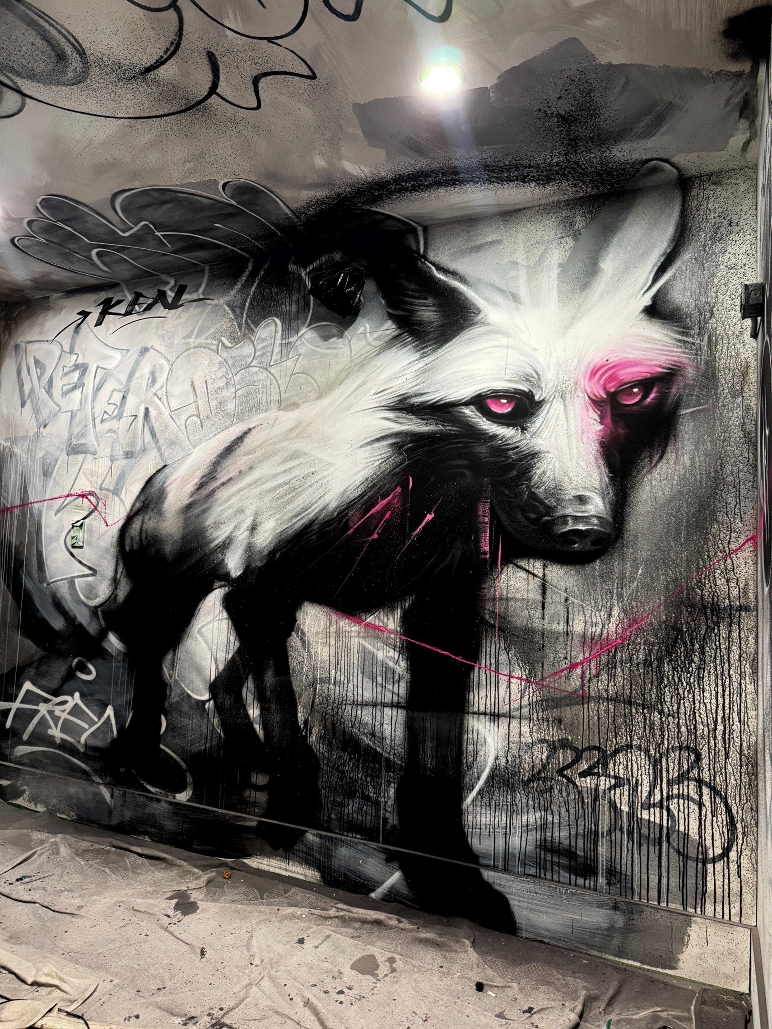 Black, white and pink interior mural — fox portrait.