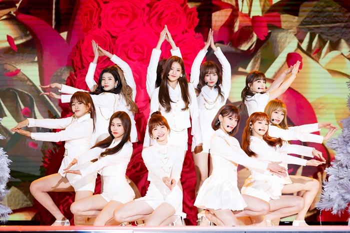 The new Korean-Japanese girl band IZ*ONE on Dec. 17 performs on stage during the 2018 Mnet Asian Music Awards (MAMA) Premier in Korea at Dongdaemun Design Plaza (DDP) in Seoul.