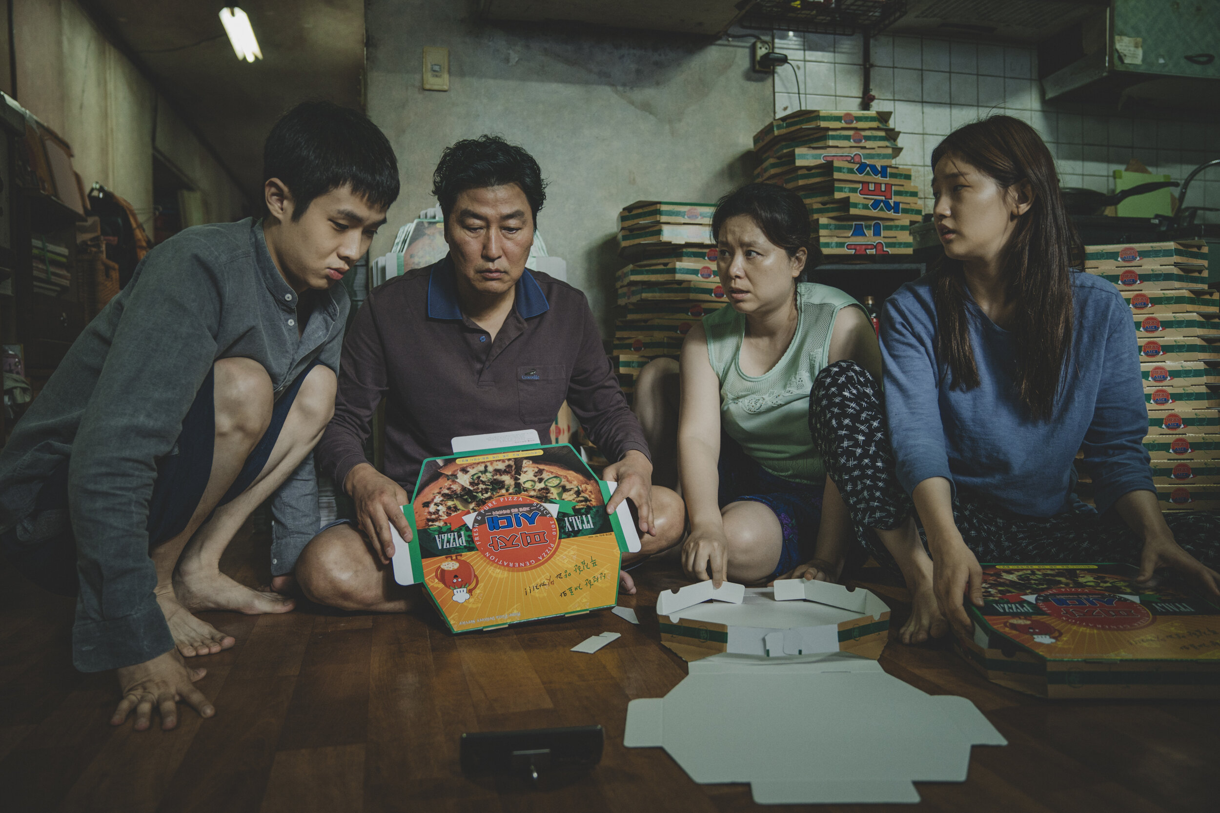 The Kim Family (Woo-sik Choi, Kang-ho Song, Hye-jin Jang, So-dam Park) in Parasite. Courtesy of NEON + CJ Entertainment.jpg