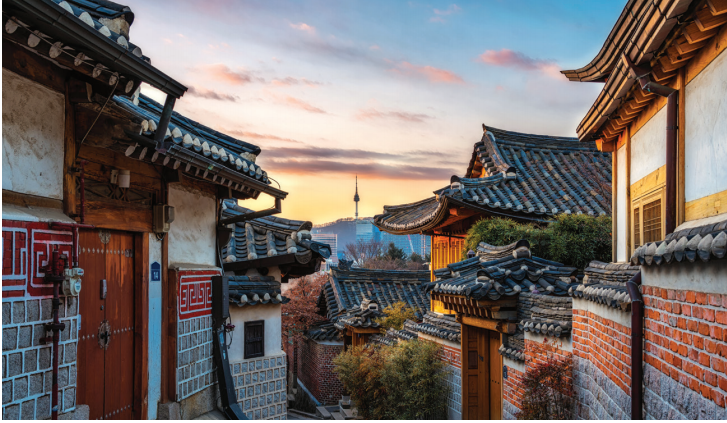Bukchon Hanok Village Village Located on the top of a hill, Bukchon Hanok Village commands a unique landscape where Korean traditional houses and modern structures harmonize together.