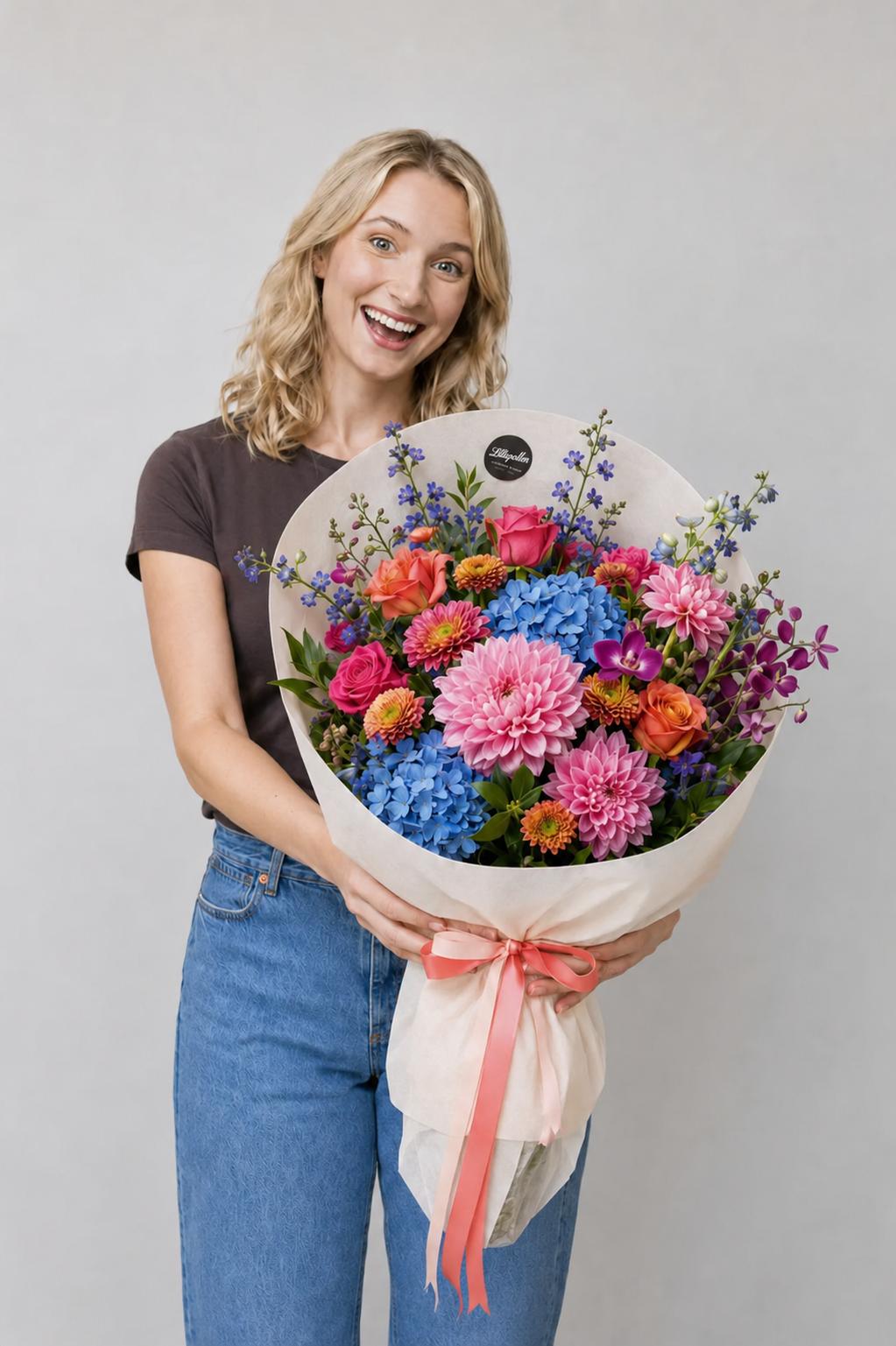 Bright seasonal fresh flowers presented as a wrapped bouquet for same day delivery in Brisbane