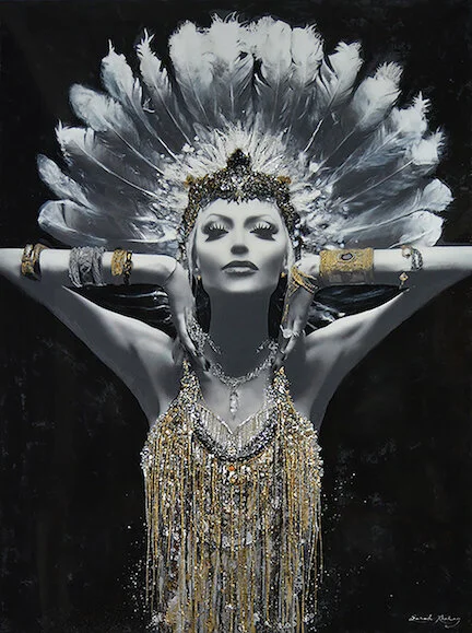 “Lady Lucent of Awakening” by Sarah Raskey took 6 months to complete and includes family heirlooms and artifacts collected in her travels. What’s more, the artist stood in as the model. That’s Sarah Raskey wearing art-couture she created. In her own multi-media, Swarovski crystal-embellished masterpiece.