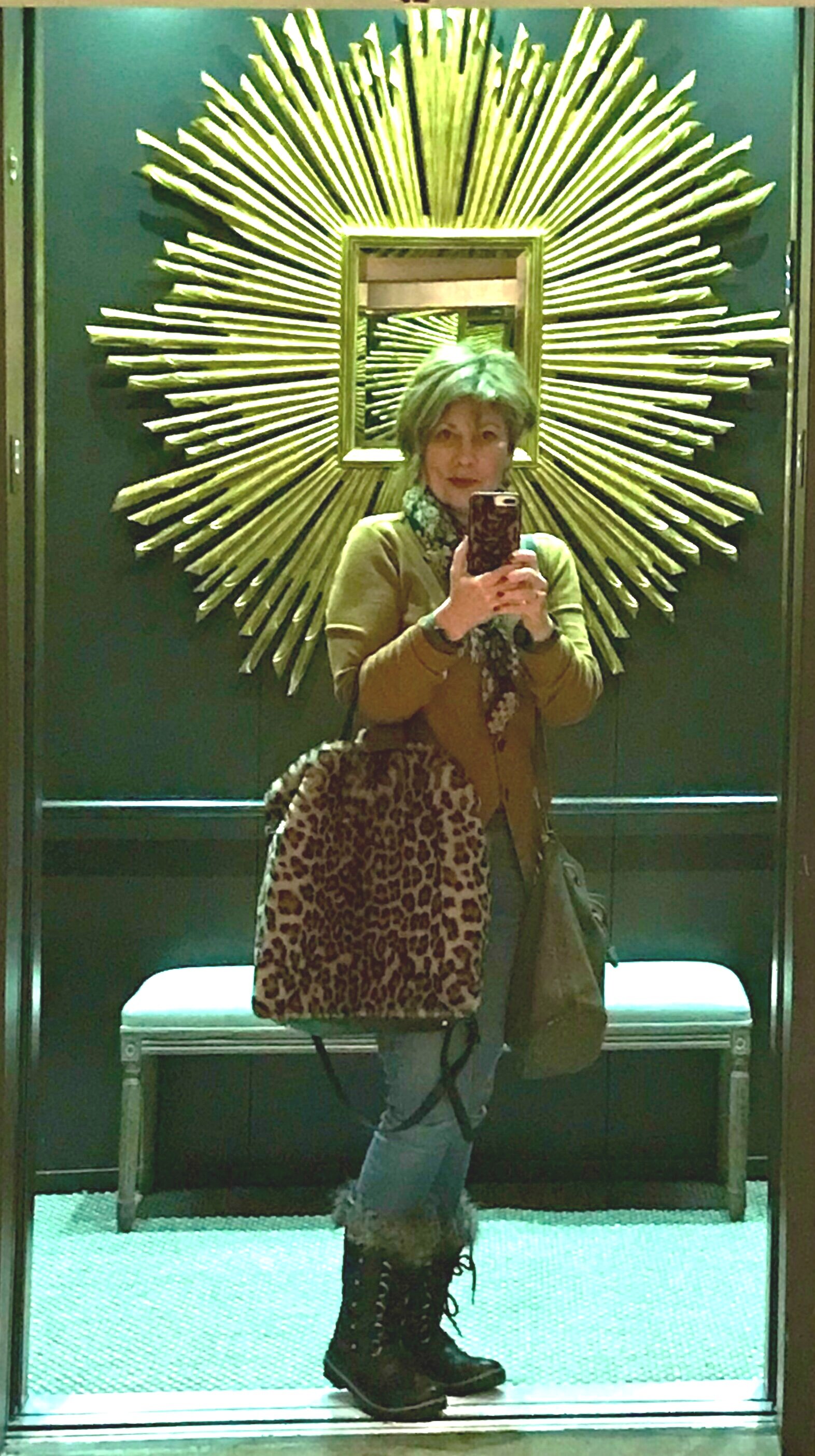 Deb in the midst of a soul-satisfying Micro-Adventure at RH Chicago. This is a peak elevator experience.