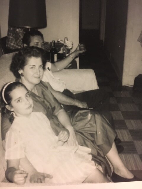 Carole shared this photo with me of her with her mother: “I think her dress was red.”