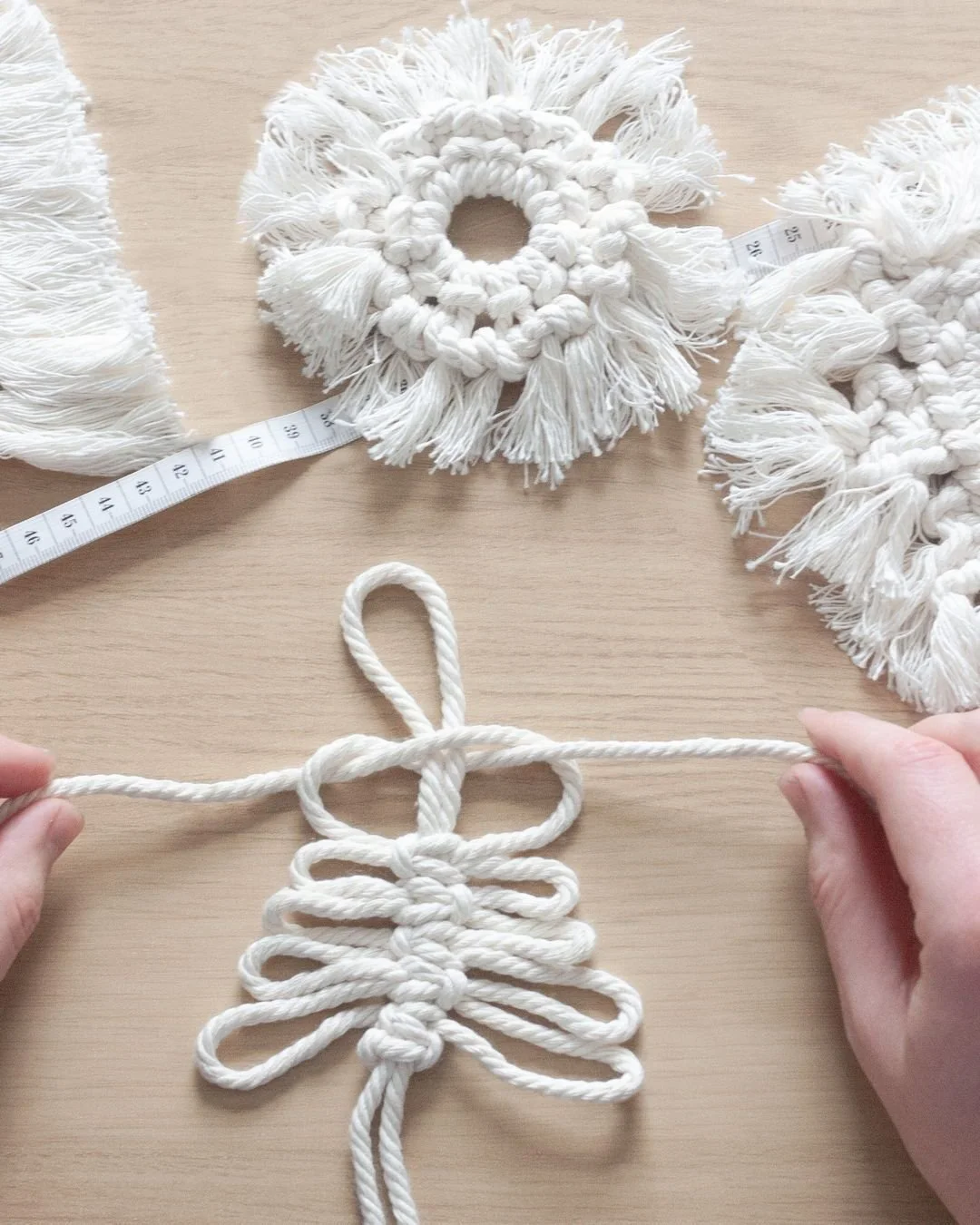 Our Macrame Decoration Making activity is available for group workshops, large event drop in stations and as a handy DIY kit too! 
This tactile festive activity gets everyone in the festive spirit and means everyone ends up with their own chic tree d