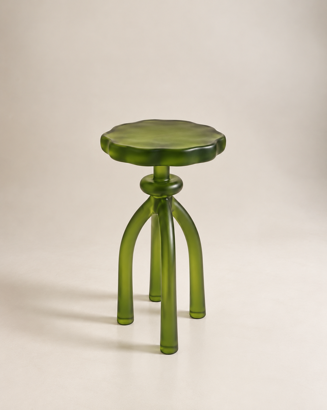 Lumpy Green Glass Tripod Stool.png