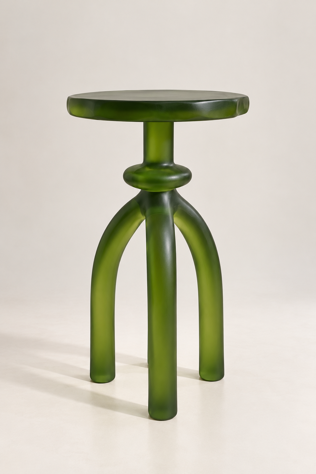 Sculptural Green Resin Tripod Stool.png