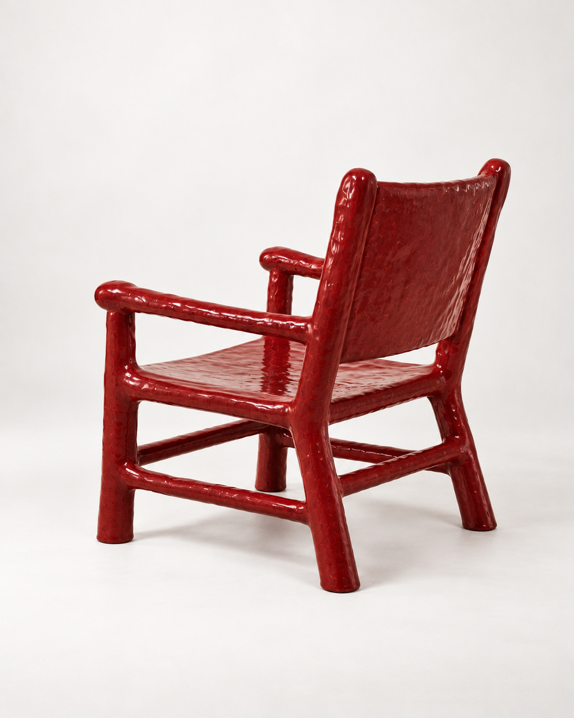 Glossy Red Sculptural Armchair.png