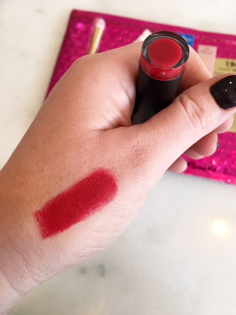 What you never knew you didn't want to see-- a red lipstick swatch on my man hand. 