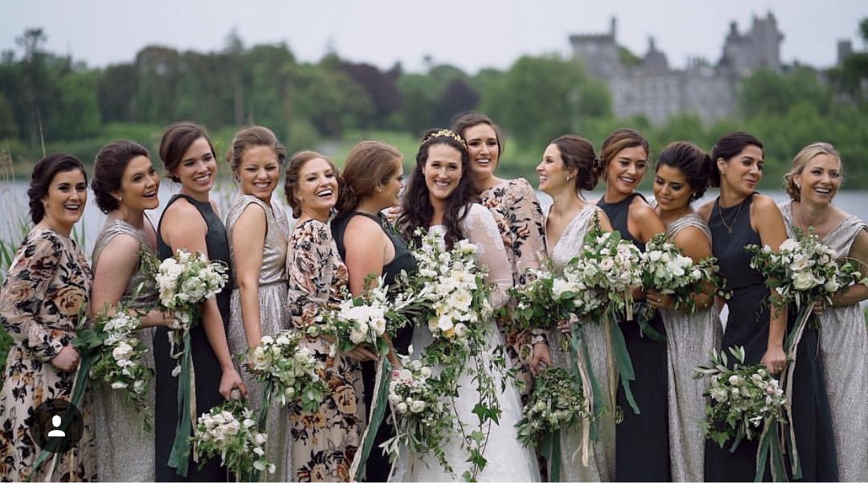 A bride with her maids and their gorgeous dresses!