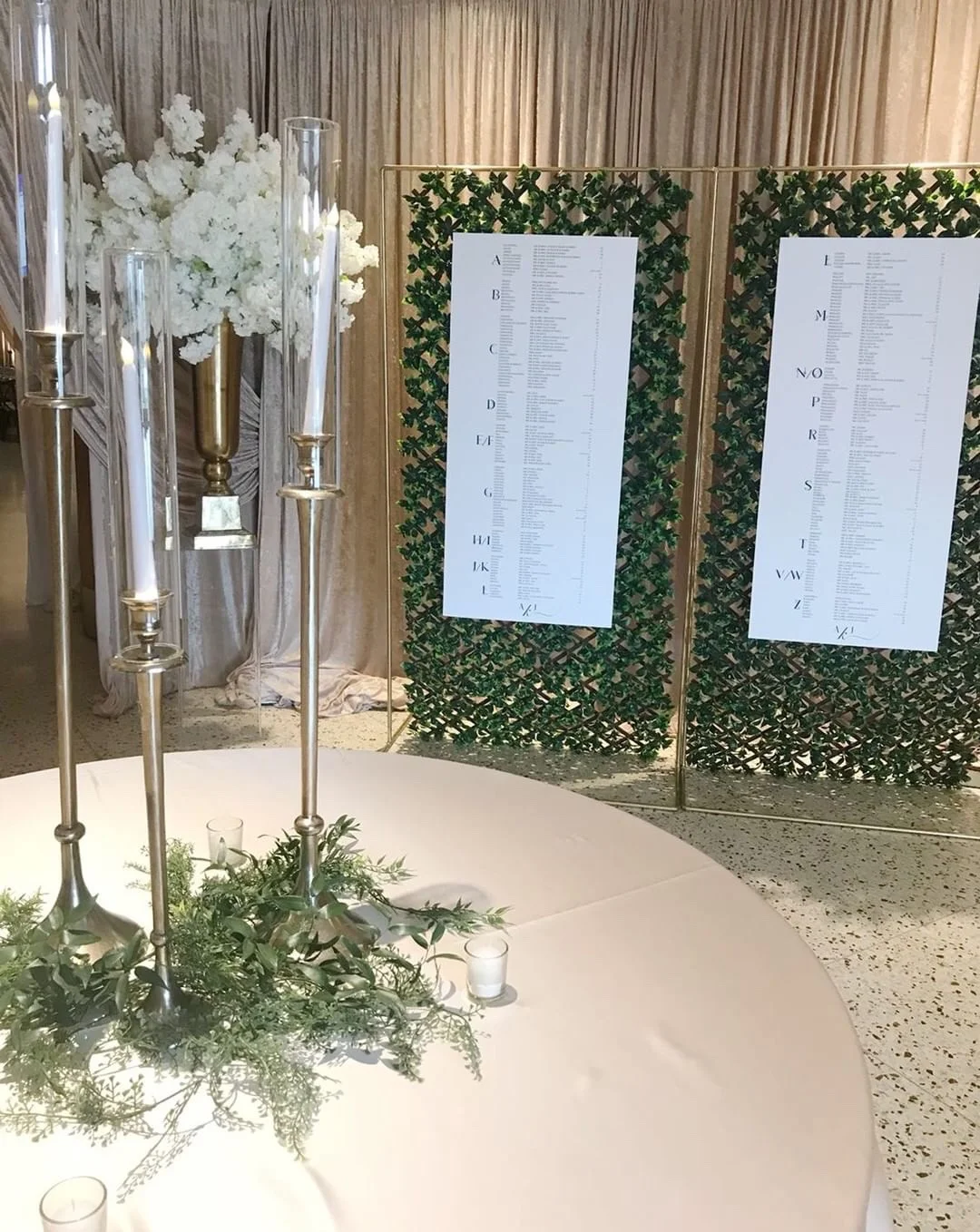 Seating Chart with Greenery Backdrop Windsor Wedding.jpg