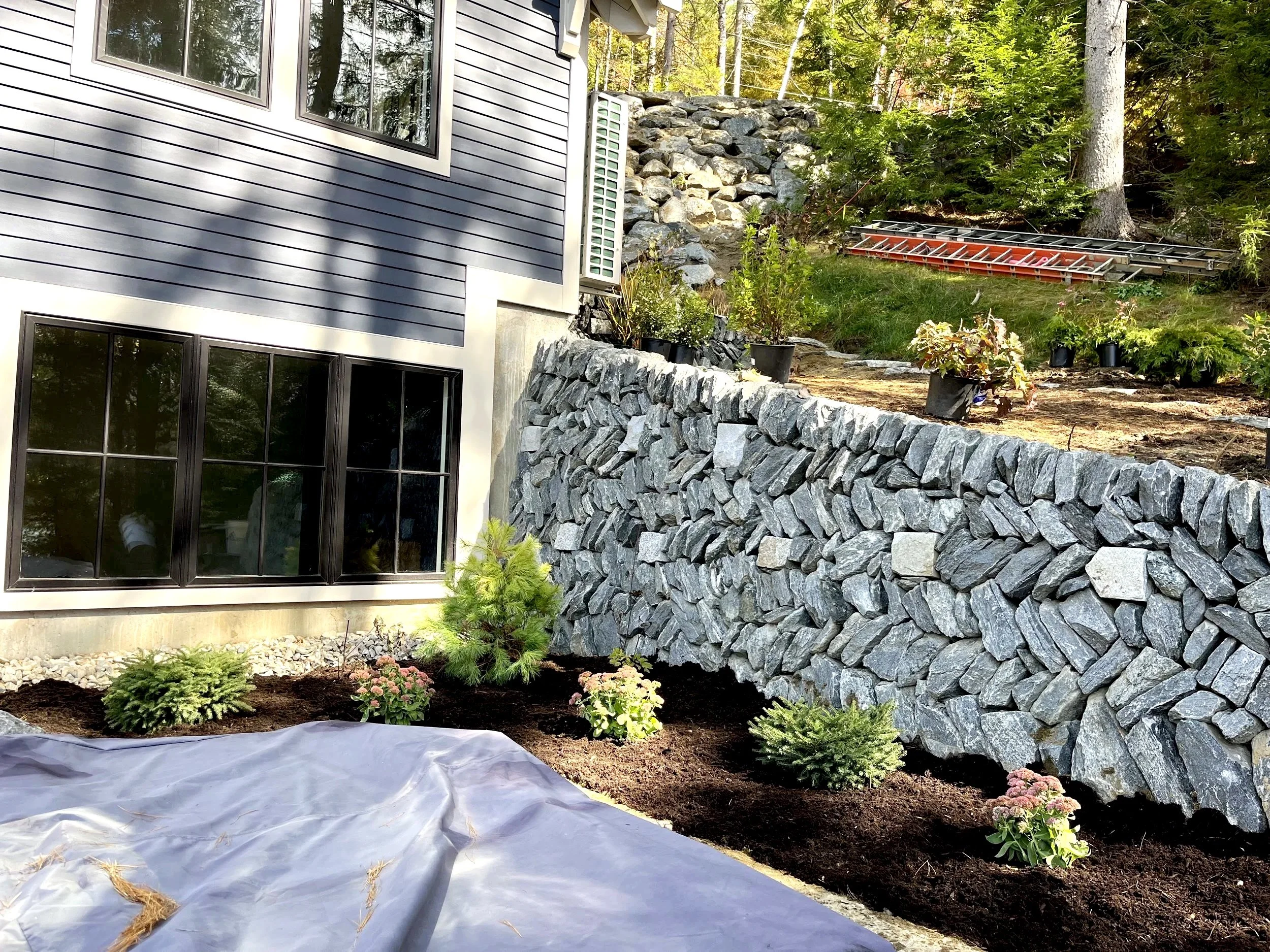  Plantbeds among the stunning herringbone stone walls crafted by Standing Stone, LLC 