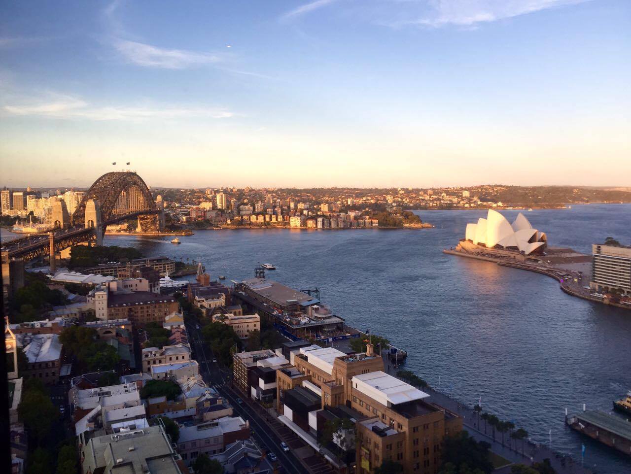 No shot of Sydney's skyline is complete without the  Sydney Harbor Bridge  (left), and the  Sydney Opera House.&nbsp; Tourists have the option of climbing the bridge, awarded with panoramic and unparalleled views of the city. Harnesses ensure your s