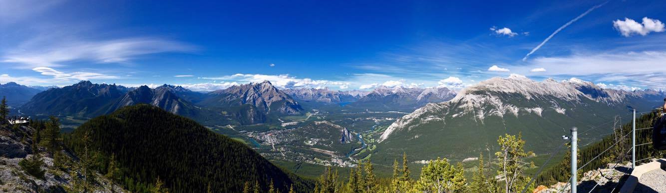  Astonishing hues of blue, green, white and ash dominate the scenery as far as the eye can see. On a clear day, the Canadian Rockies are a wonder to behold from this vantage point. 
