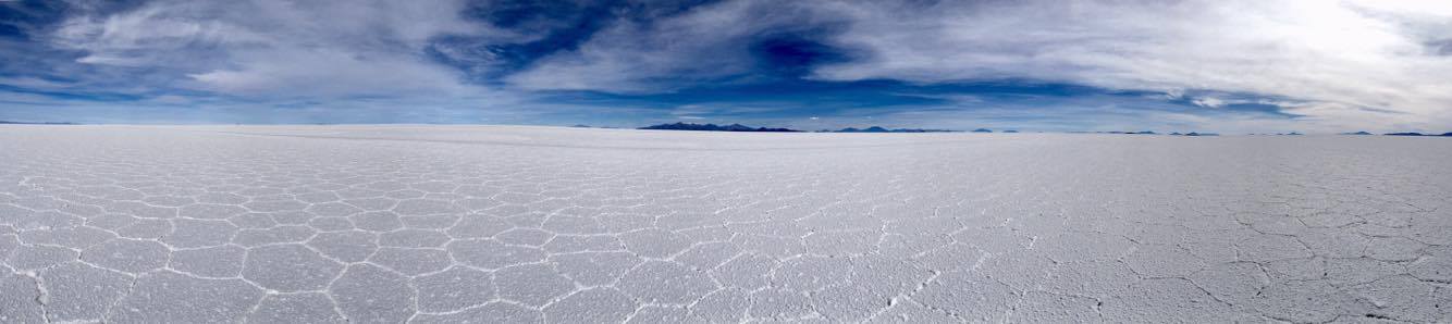  Even panoramic photos don't do the vastness and endless salt plains justice. Here, the sky and the flat seem to coincide at the edge of the world, and there is nothing here, except salt. 
