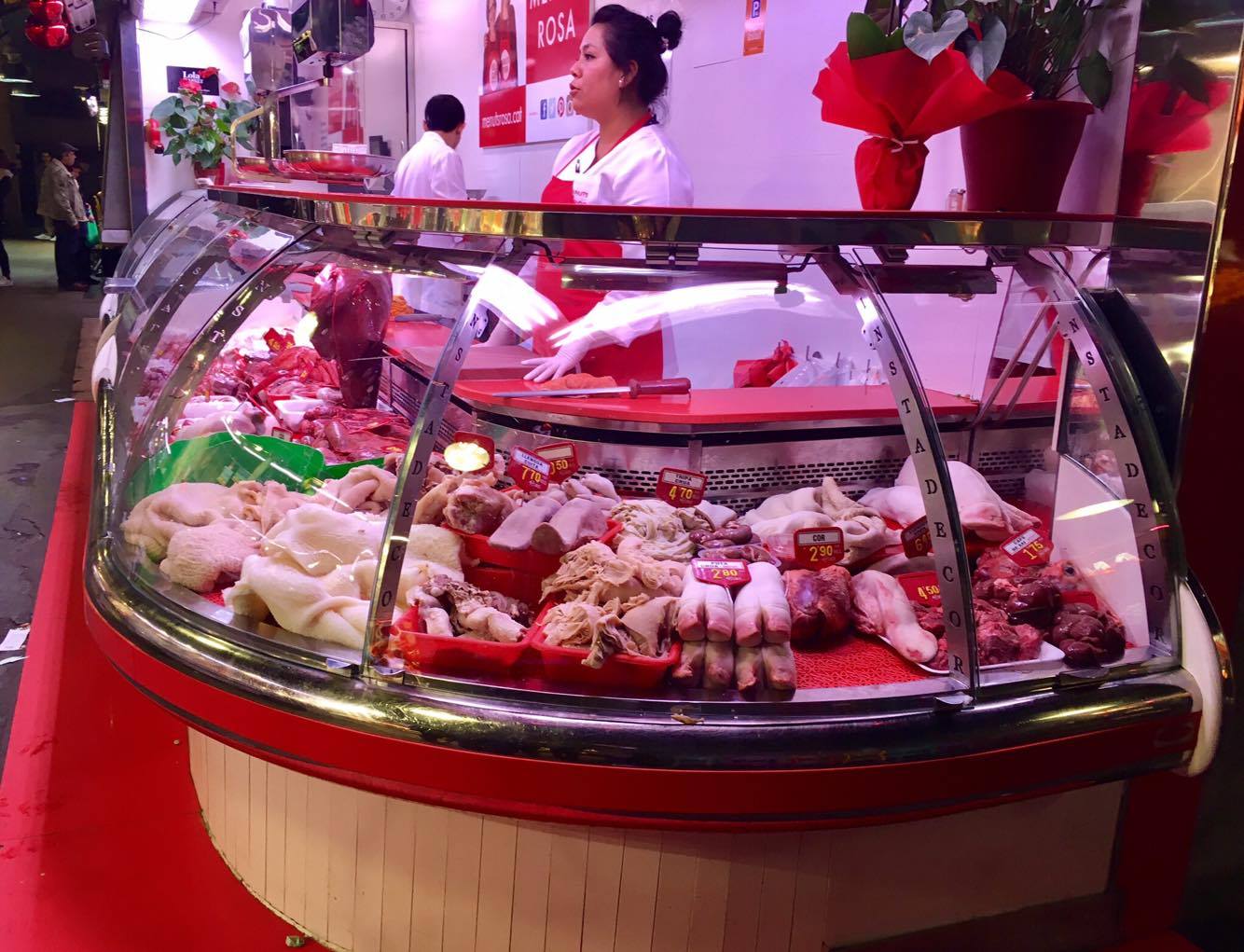  A butcher selling pig hooves, and tripe. Dim sum, anyone? 