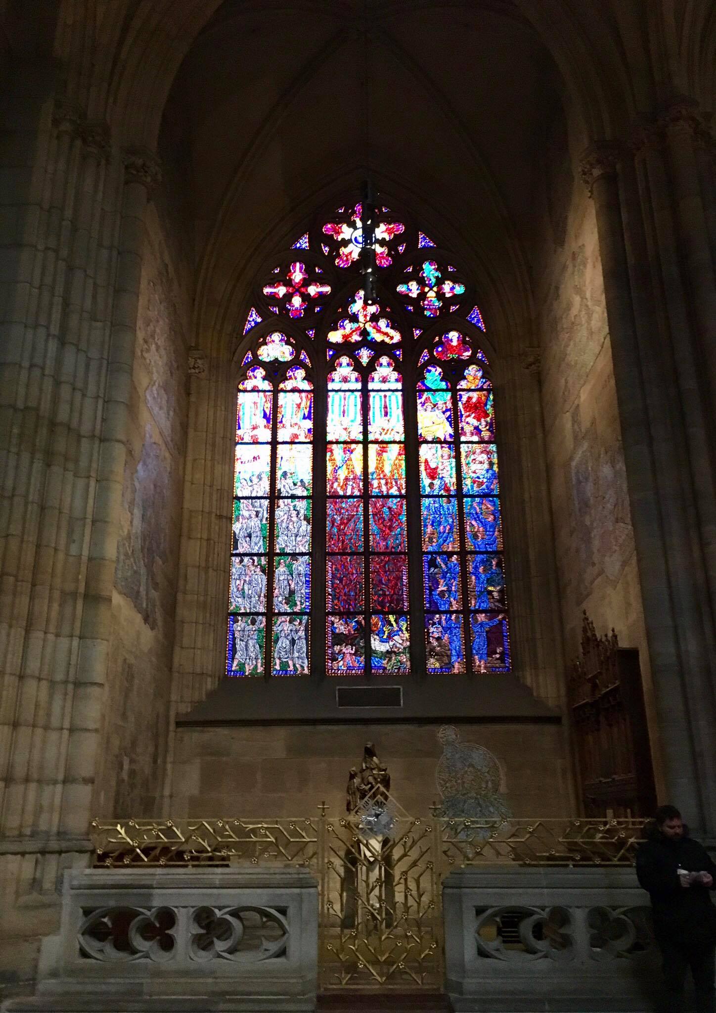 A stunning stained-glass window off to one side of the cathedral.