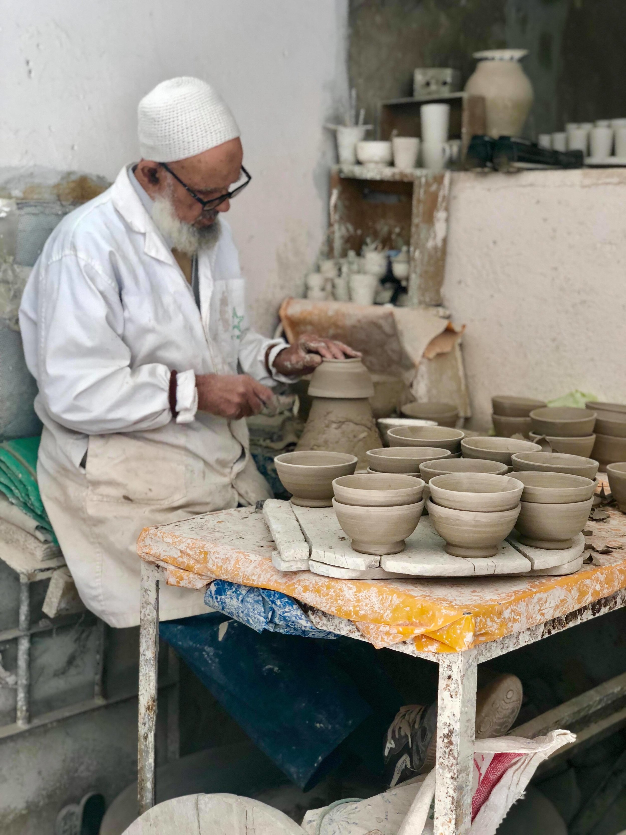  The pottery is then fired up in a kiln, seen here in its primitive form. 