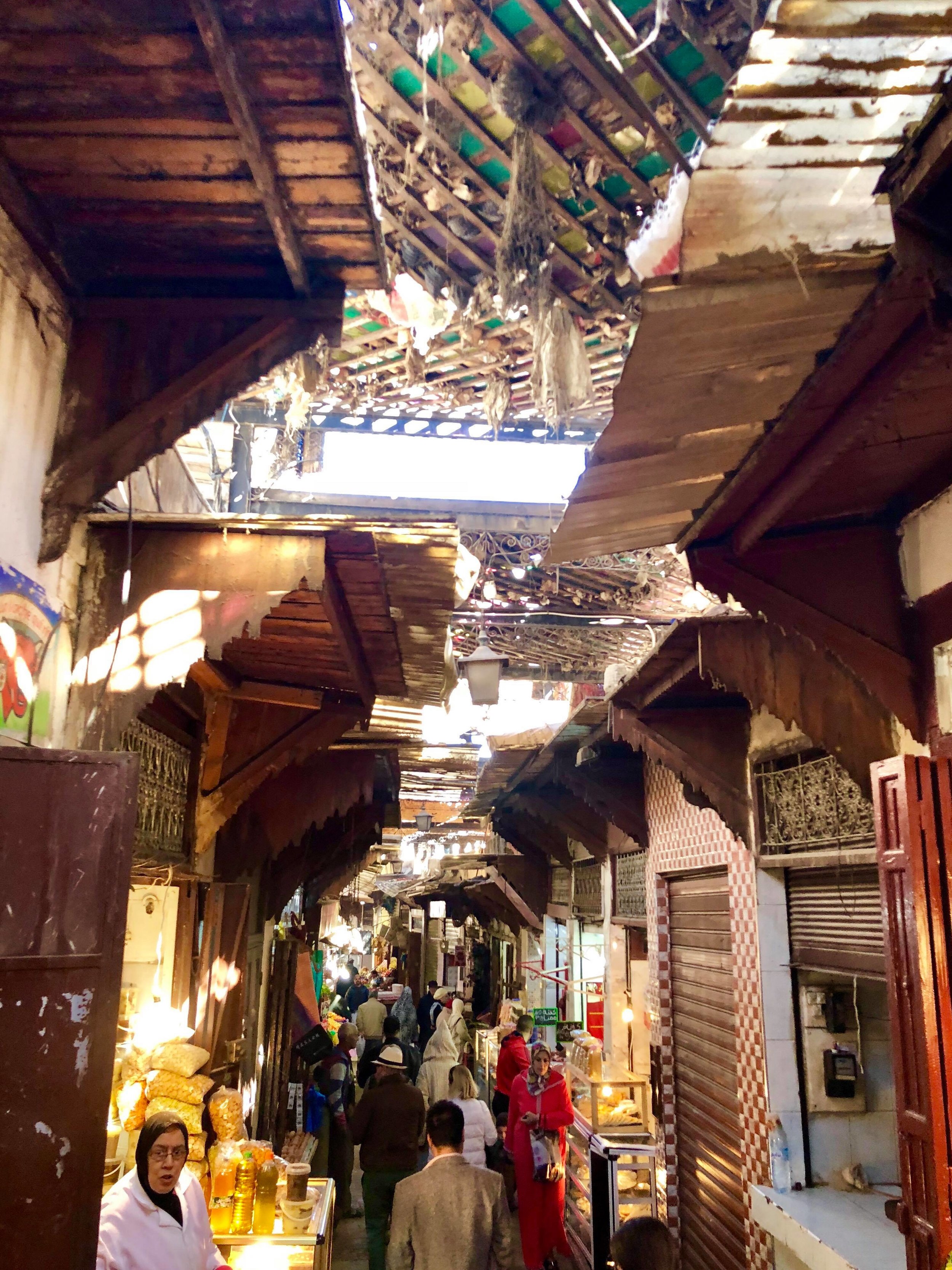  This alleyway seems to be one of Laundromats, whom wash and dry batches of clothing on the streets and inside the courtyards. 