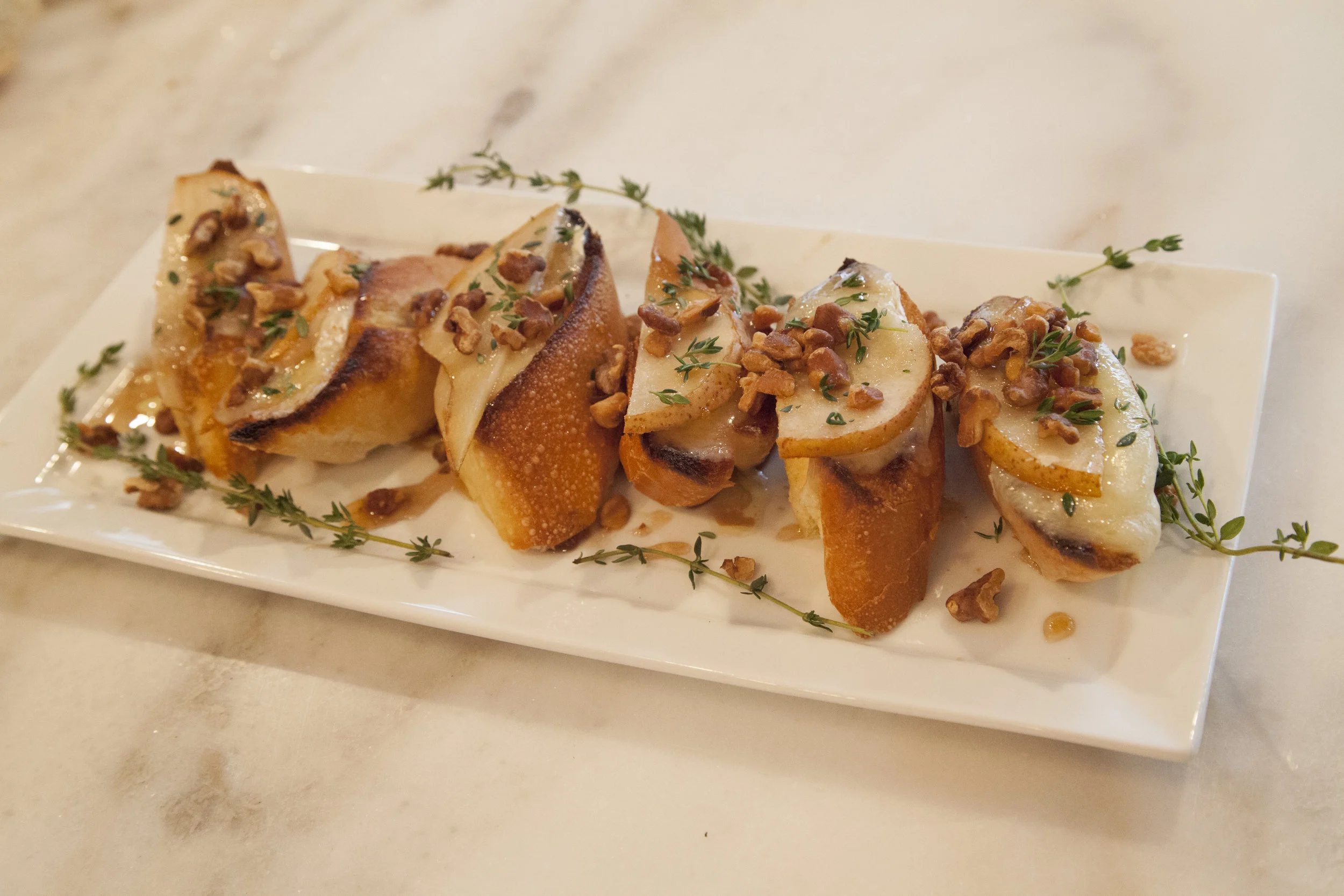 Partridge in a Pear Crostinis