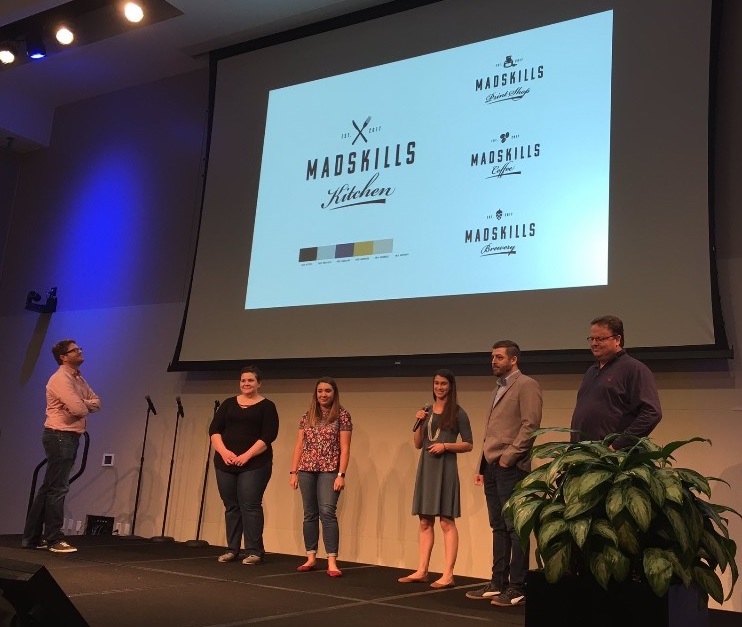 The projekt202 team stages its BarnRaise presentation to the public.
