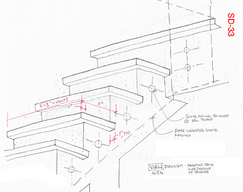 Detail of stair from basement to first floor, showing placement of attachment bolts for the glass panels along the side of the stair. Image: Mark English Architects