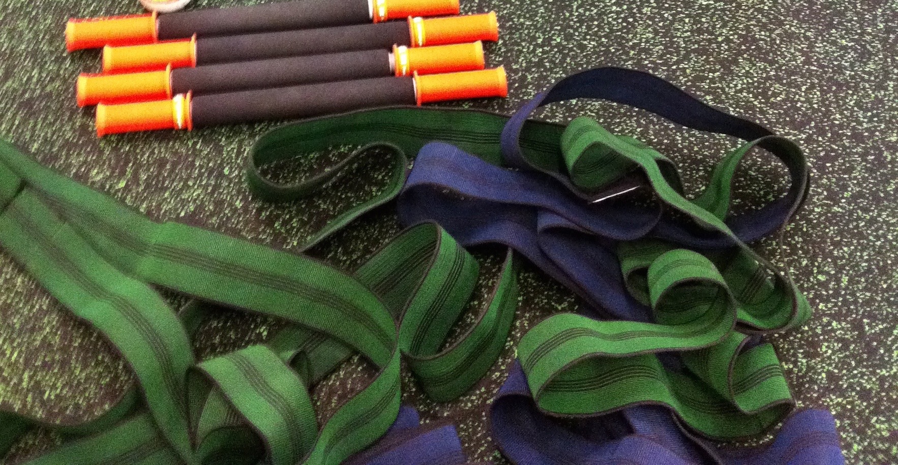 Our mobility/flexibility bands (and Tiger Tails) waiting to be used for the Broncos pre-game warmup at Suncorp Stadium. Rollers and LAX balls were also part of the bunch of tools available to players to address their personal mobility and flexibility issues before starting the TEAM WARMUP.