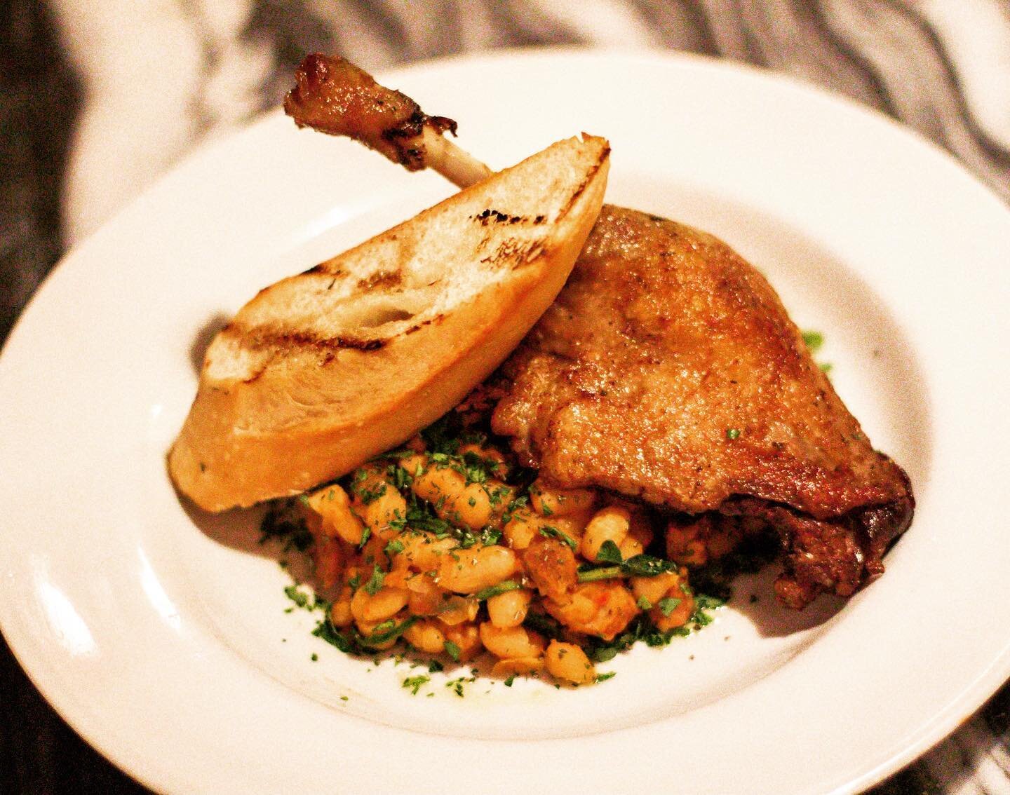 There&rsquo;s nothing better to warm you up this holiday season... A full leg of duck confit over a pork and sausage cassoulet. This is just one of the spectacular choices featured on our Christmas and New Year&rsquo;s Eve menus. Delicious  and class