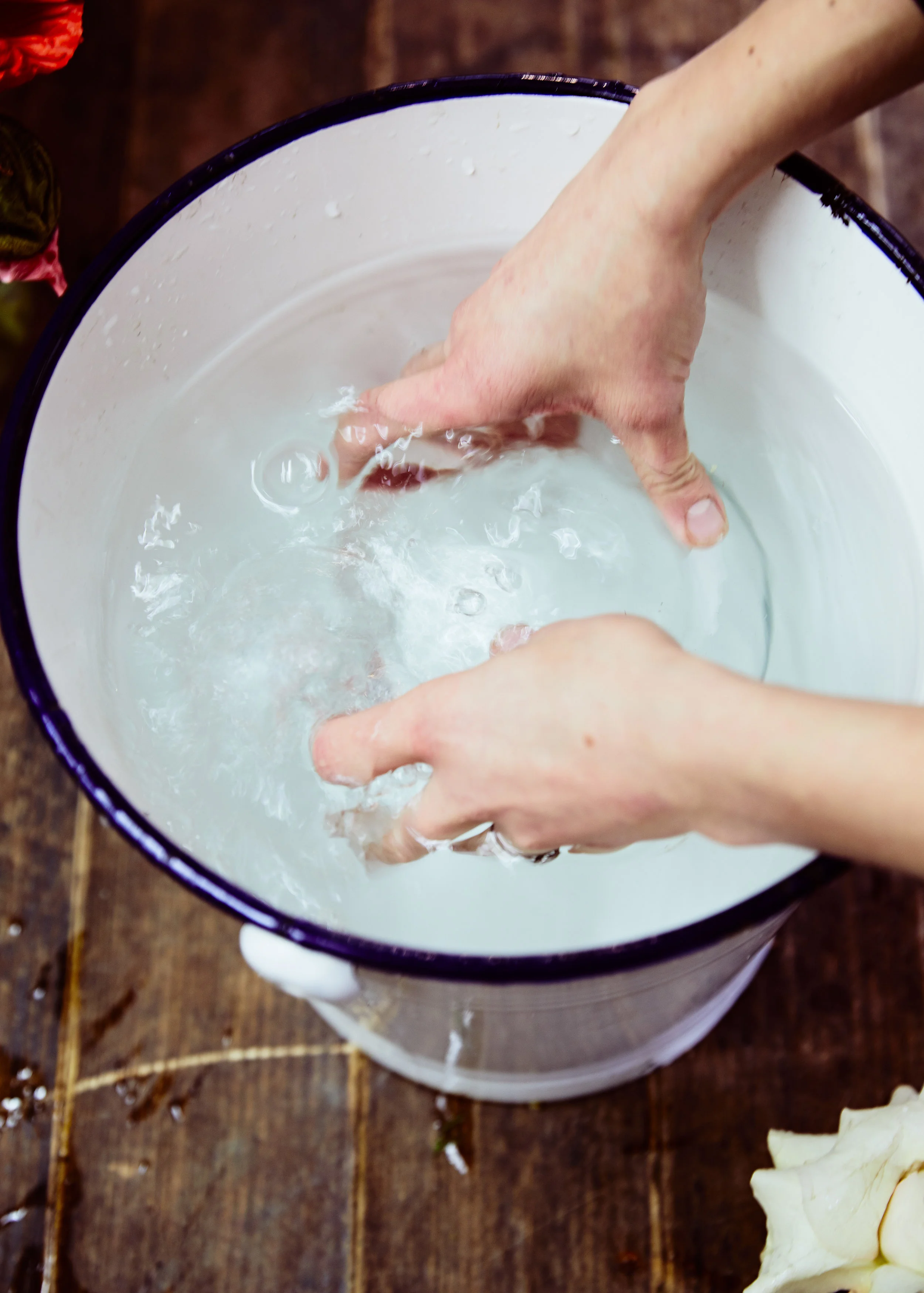 Submerge the glass globe in cold water
