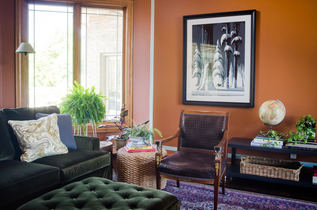 The orange wall color was the perfect compliment to let her love for plants and nature shine through.