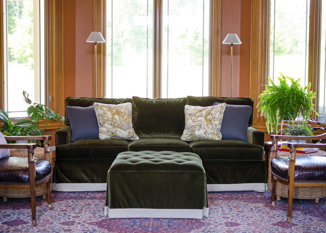 In this welcoming entry seating area, color and natural light add impact to practical function.