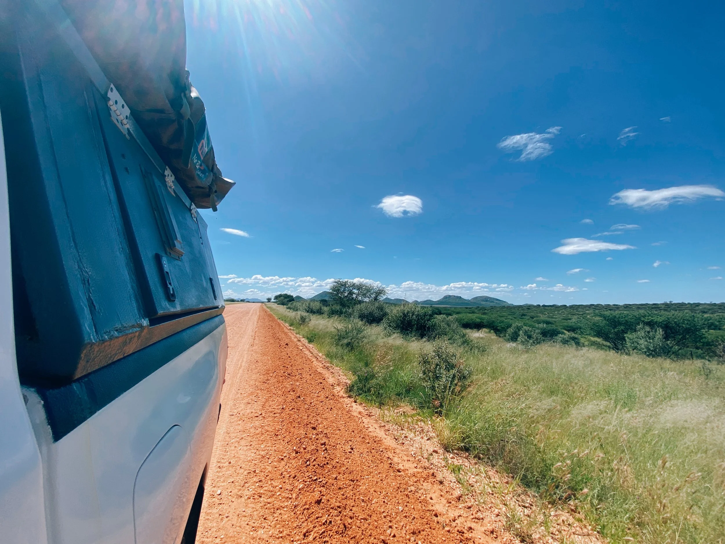 4x4 with rooftop tent driving gravel sand roads to Sossusvlei