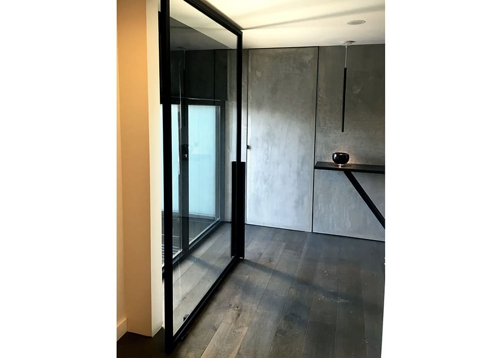 Private Residence Large Pivot Door With Custom Handle And Electronic Lock