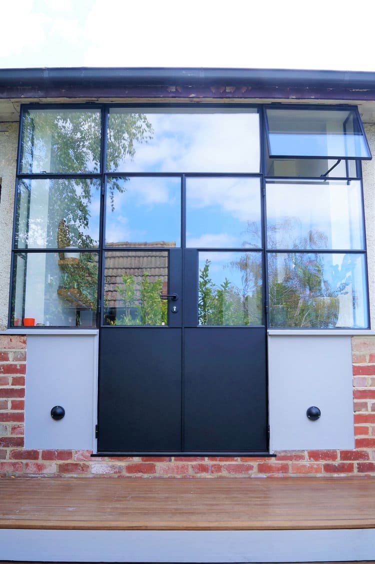 Private Residence Hinged Double Doors With Kicked and Fixed Window Panels