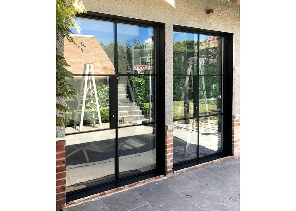 Private Residence Two Double Doors In Large Steel Reveals