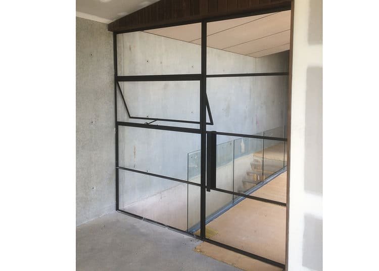 Private Residence Cavity Sliding Door in Concrete Wall