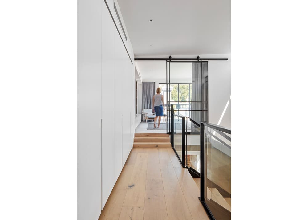 Private Residence Large Wall Hung Sliding Door Over a Void