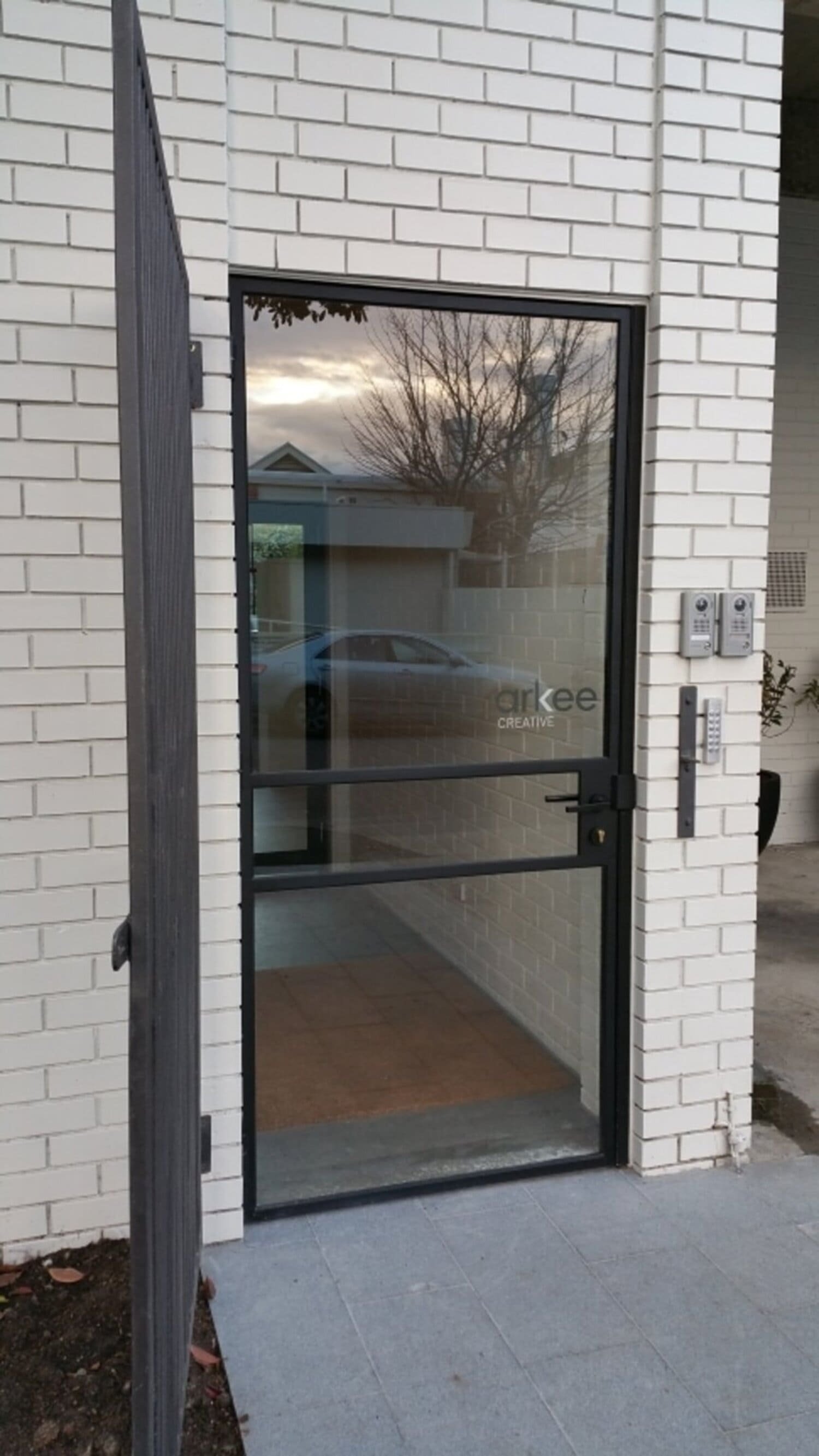 Three Panel Narrow Center Single Entry Door