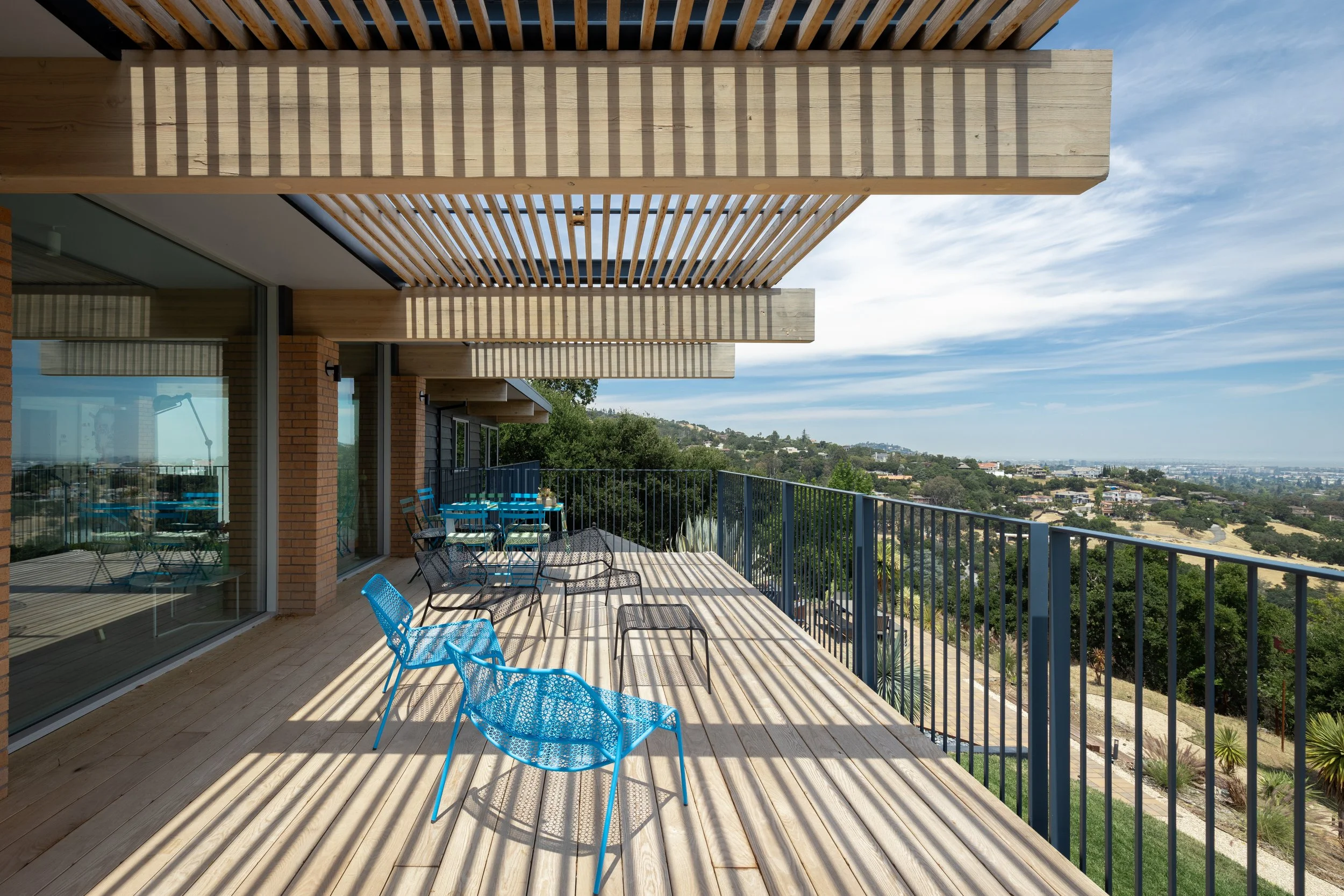 Mid-Century Modern home with cantilevered deck and panoramic views of the Bay Area.