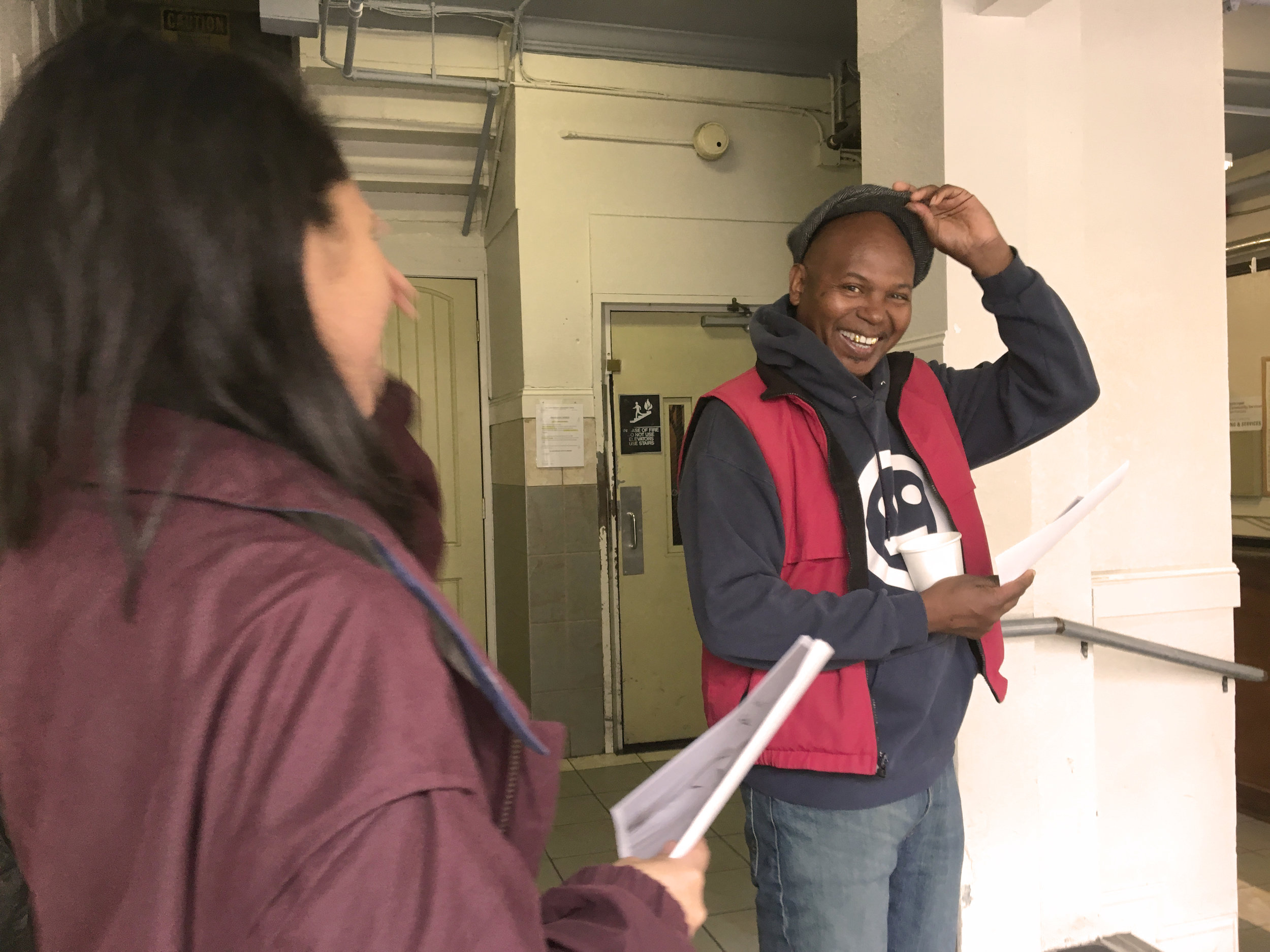 Darnell receiving his own portrait handout. 