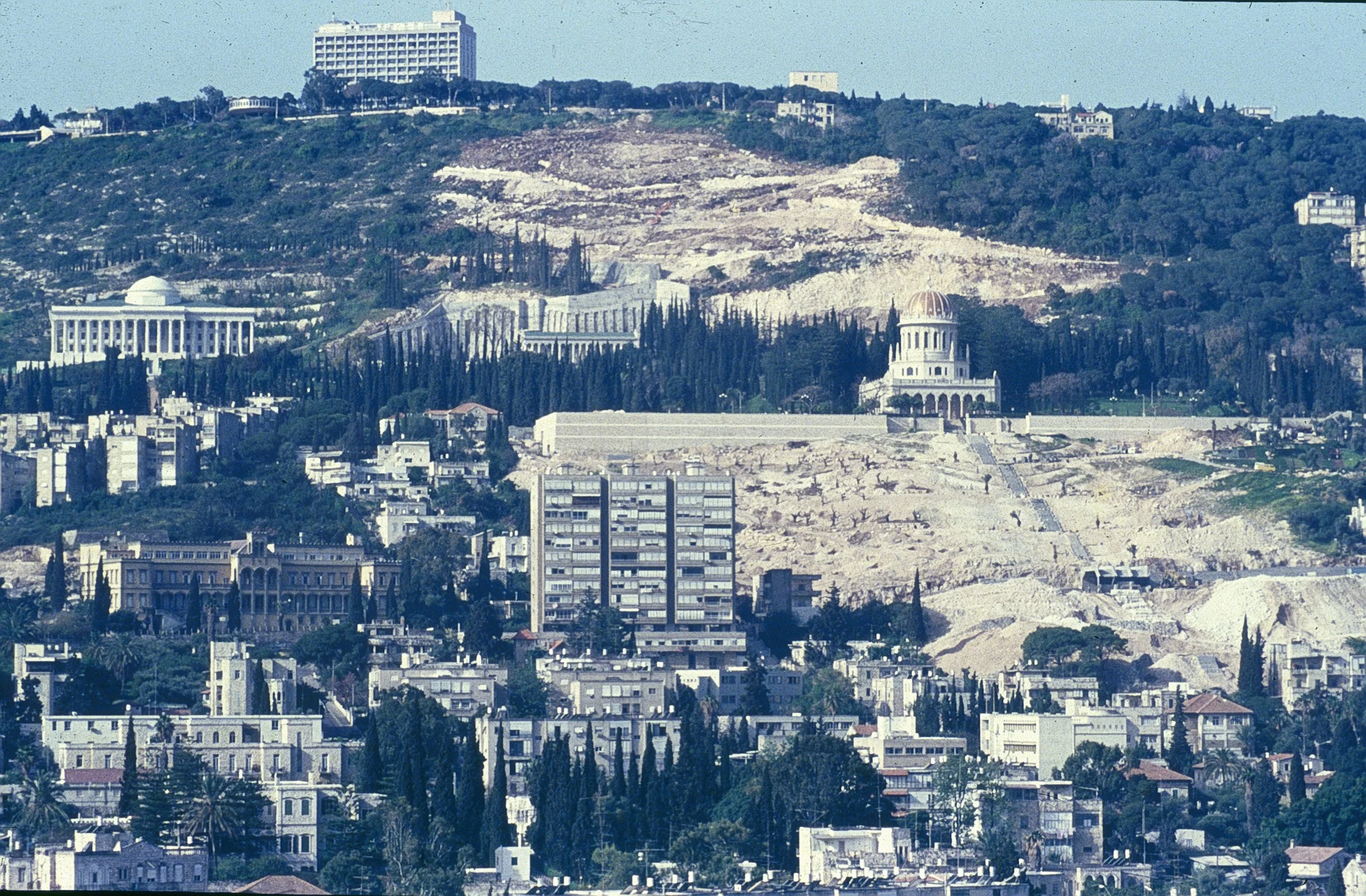 The 1990s witnessed the challenging task to build garden terraces from the bottom to the top of Mount Carmel. This photo show the site being prepared for construction of the terrraces. The completion of the project fulfilled the vision of 'Abdu'l-Baha and provided an exquisite setting for the jewel that is the Shrine of the Bab.
