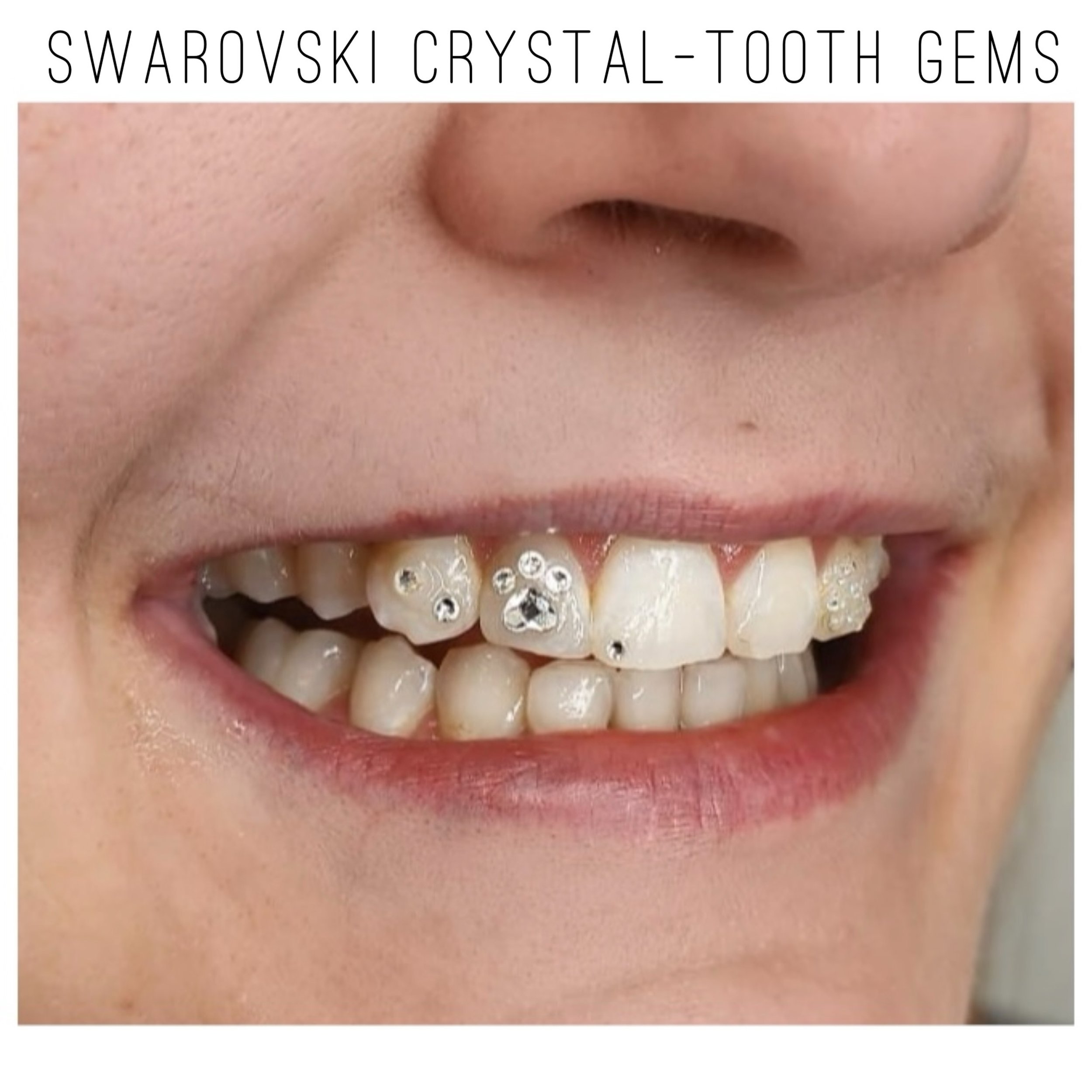 Love the paw print our client asked us to create. 🐾 Elevate your grin with the glimmer of a shaped Swarovski crystal tooth gem. Your tooth gem is designed to endure for at least six months, ensuring it stays stain-resistant and glossy. Tooth Gems by