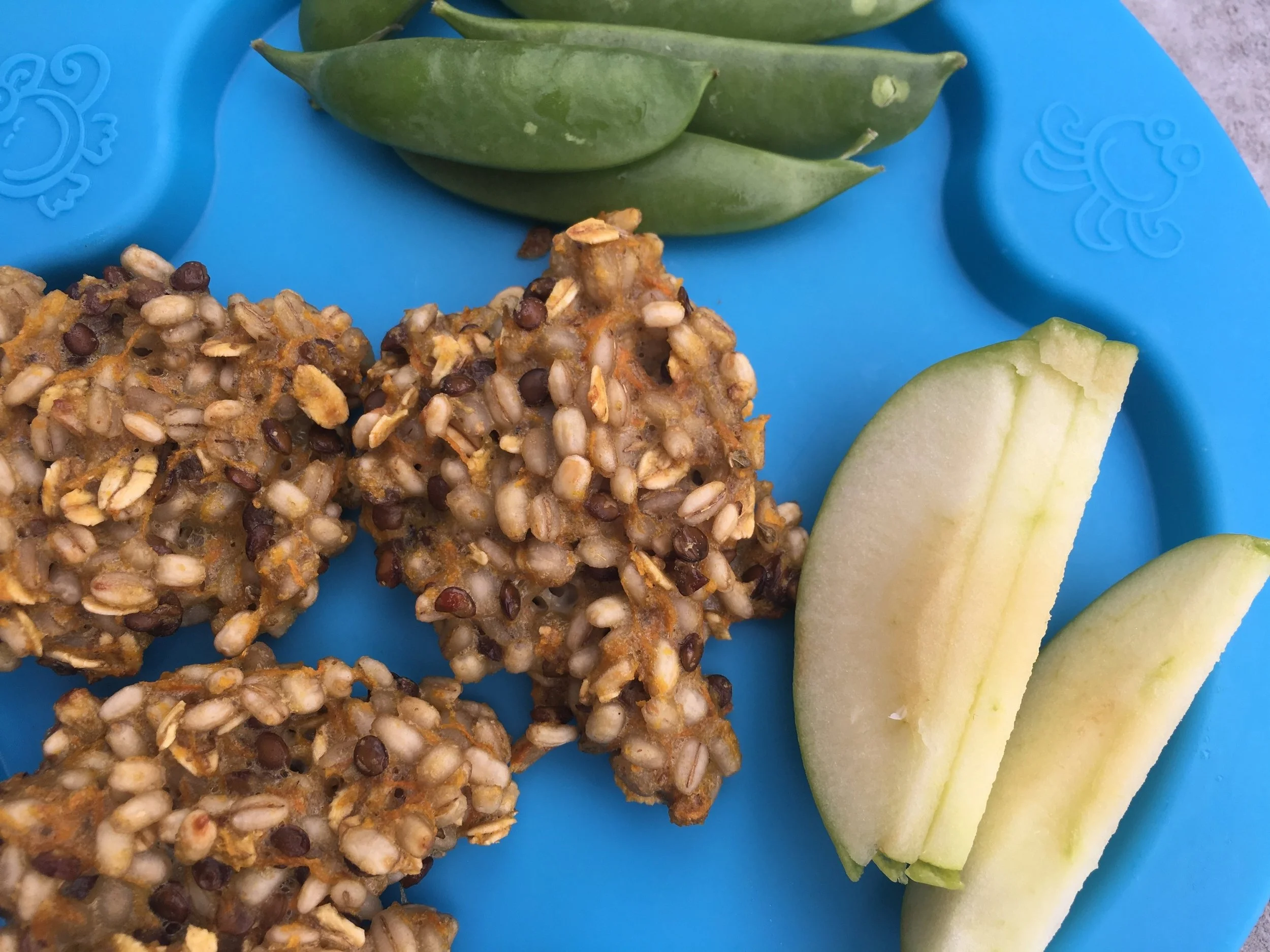 Repurposed barley and lentils into a baked fritter. Added some grated carrot for extra nutrition and served with sliced apple.