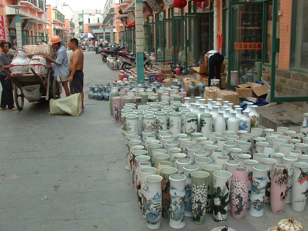  one of the outdoor pottery markets selling locally produced wares 
