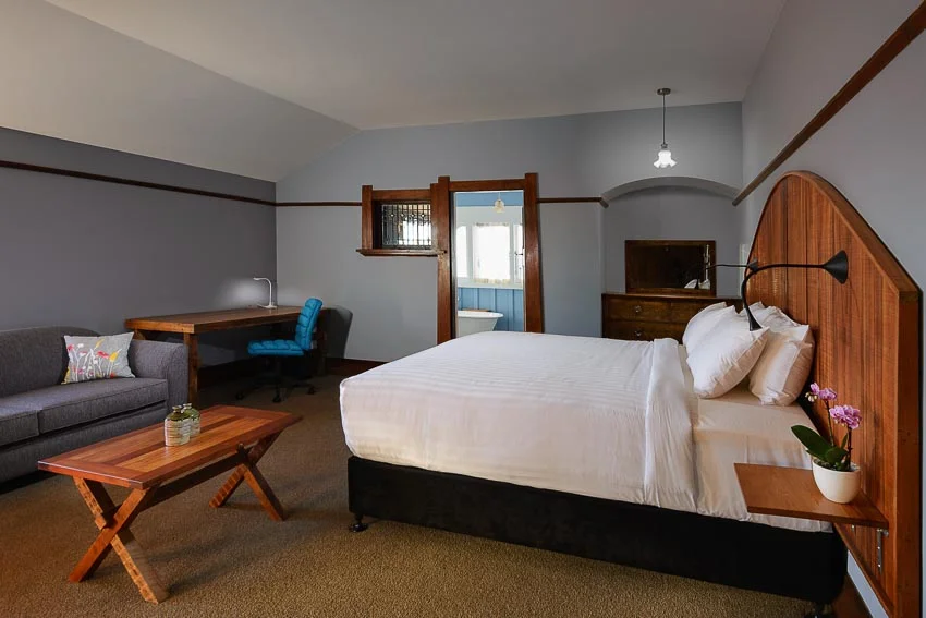 The Oak Luxury Super King Room with fold out couch upcycled furniture Eco Villa Unique Christchurch Accommodation.jpg