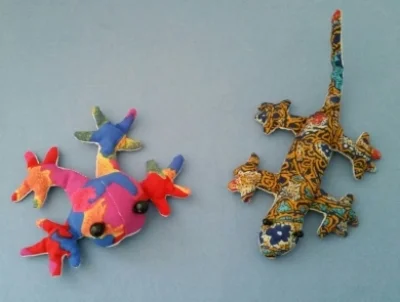  Frederick the Frog is next to Lizzie the Lizard.