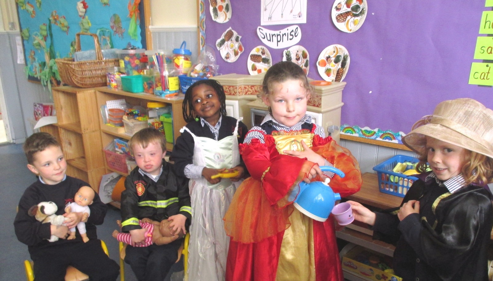 feeding the babies in the home corner.JPG